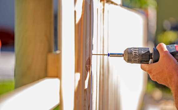 drilling into a fence